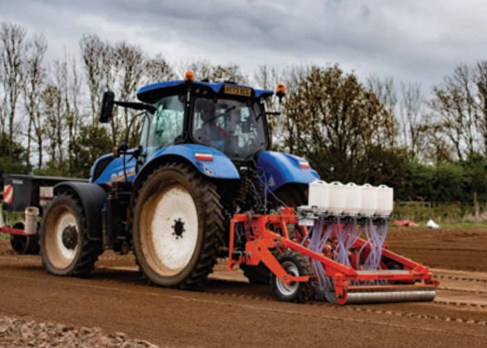 Tractor towing Stanhay seed drill unit